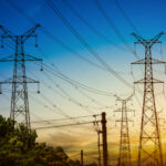 sun-setting-silhouette-electricity-pylons (1)